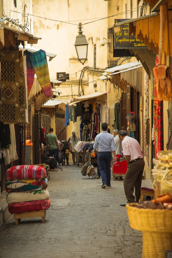 why-choose-us Explore the vibrant street market in Fes, Morocco, showcasing local culture and commerce.